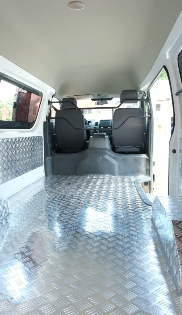 Aluminum honeycomb panel floor system for lightweight truck bodies and utility vehicles