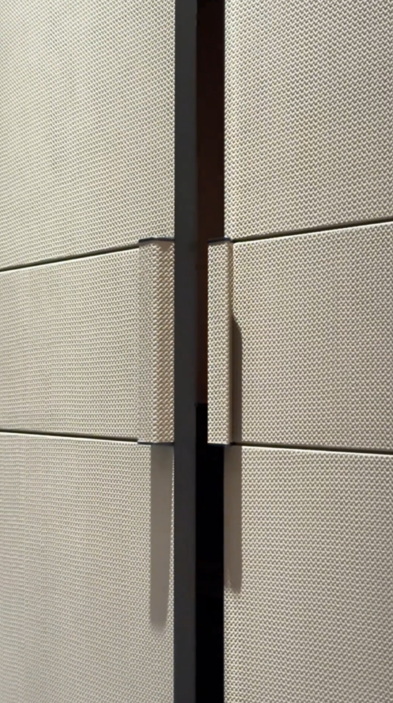Leather wrapped cabinet panel detail for luxury furniture
