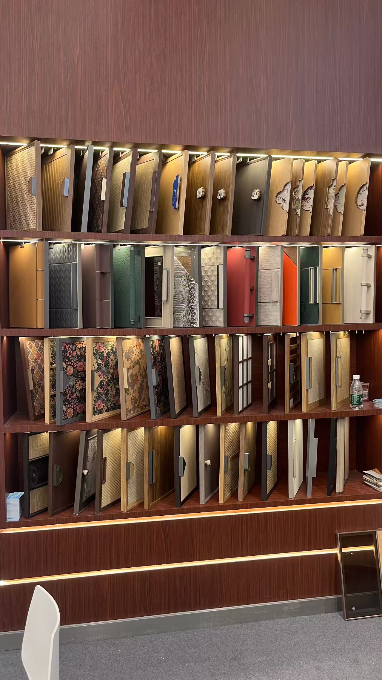 Luxury leather interior solutions panel collection showroom with custom door and furniture finishes