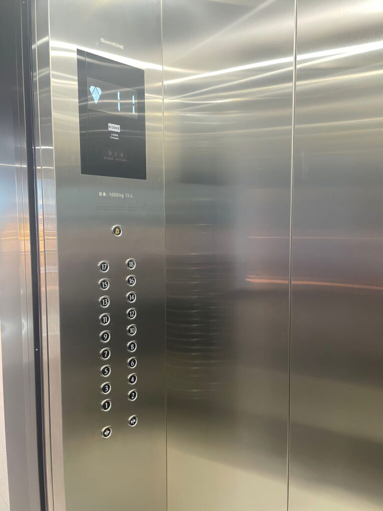 Stainless steel elevator cabin wall cladding